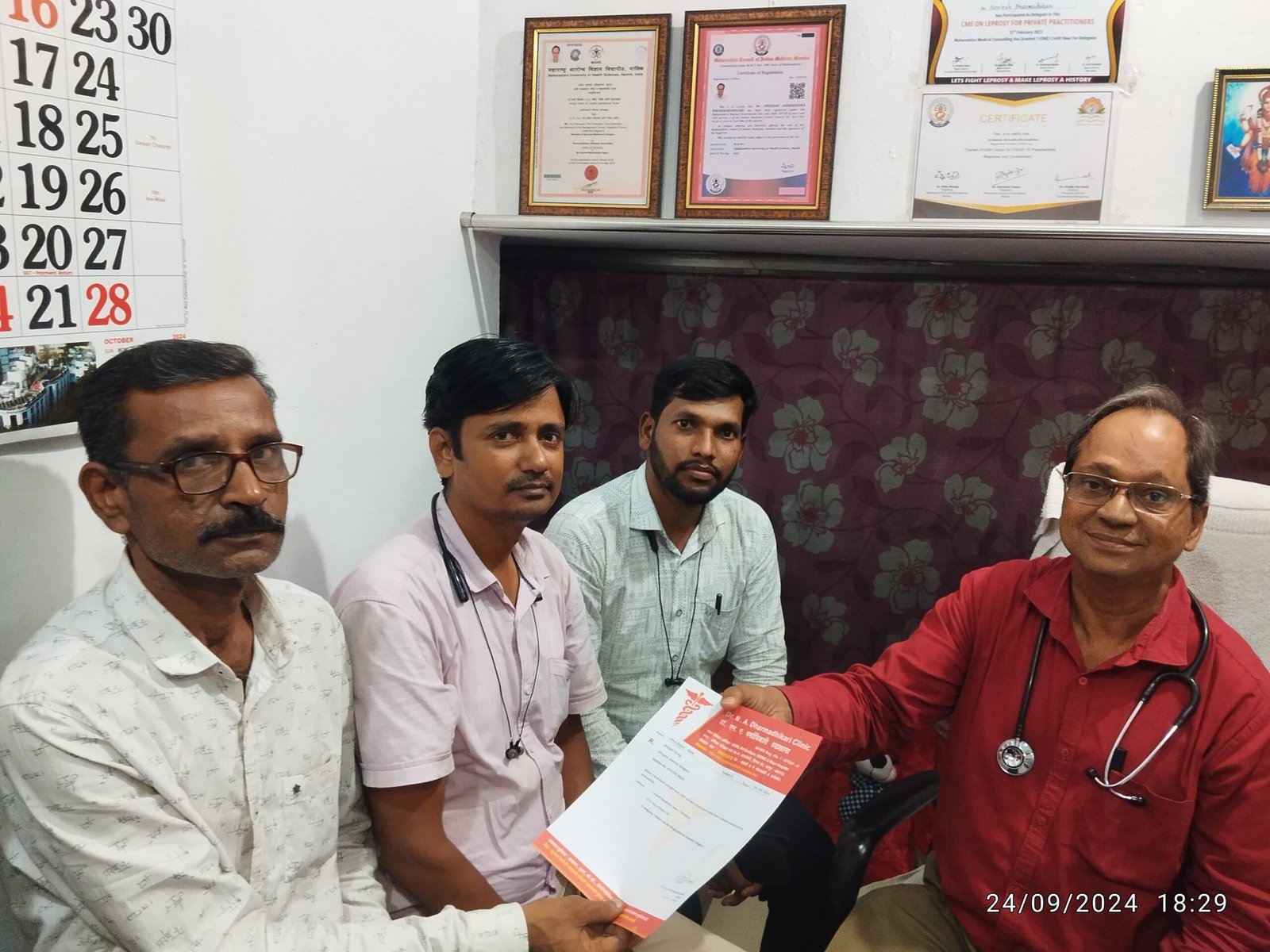 Mr. Sanjay Navghare and Mr. Sanjay Thakre with Dr. N. A. Dharmadhikari during the PPSA TB Project visit at the clinic.