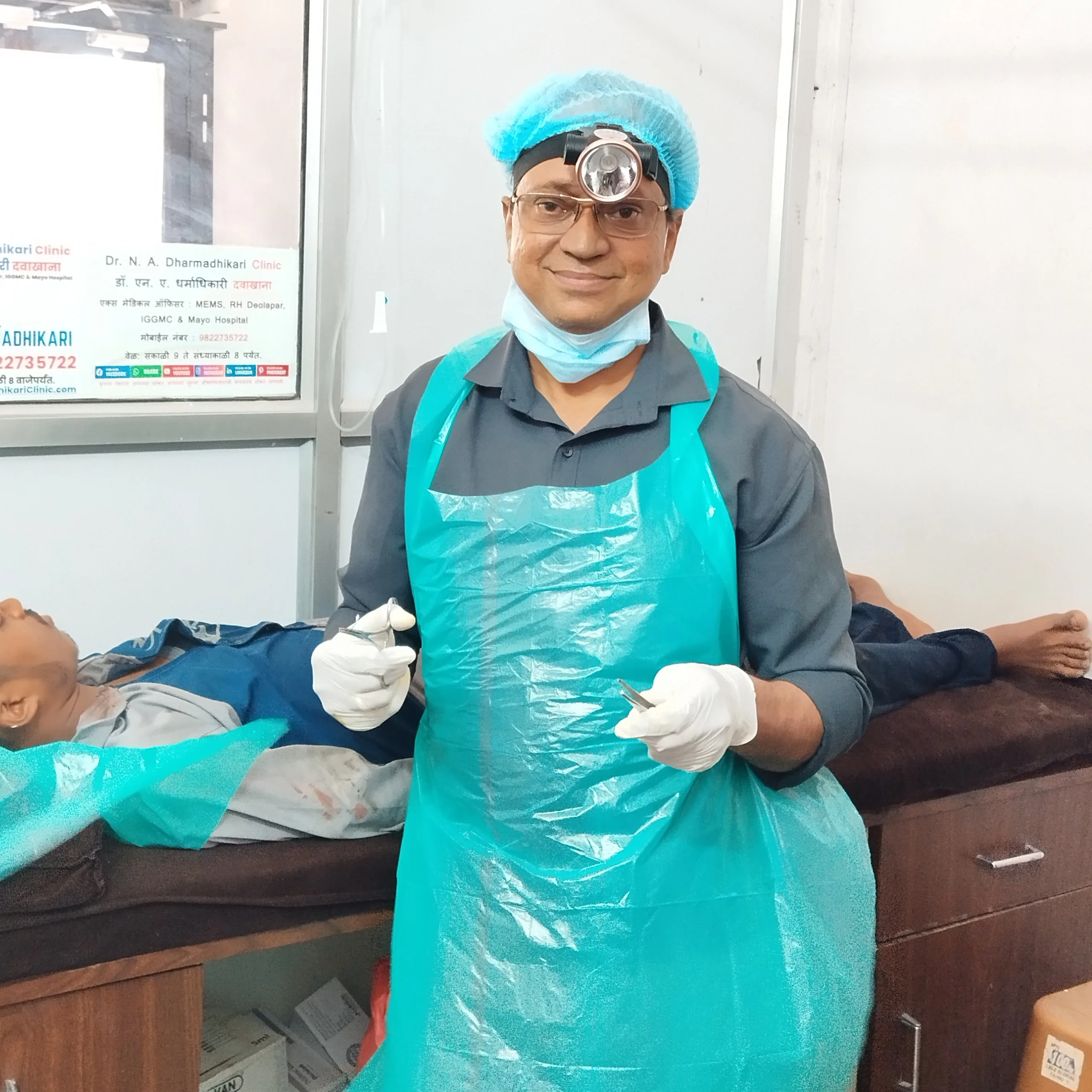 Minor scalp suturing procedure performed while protecting patient privacy.