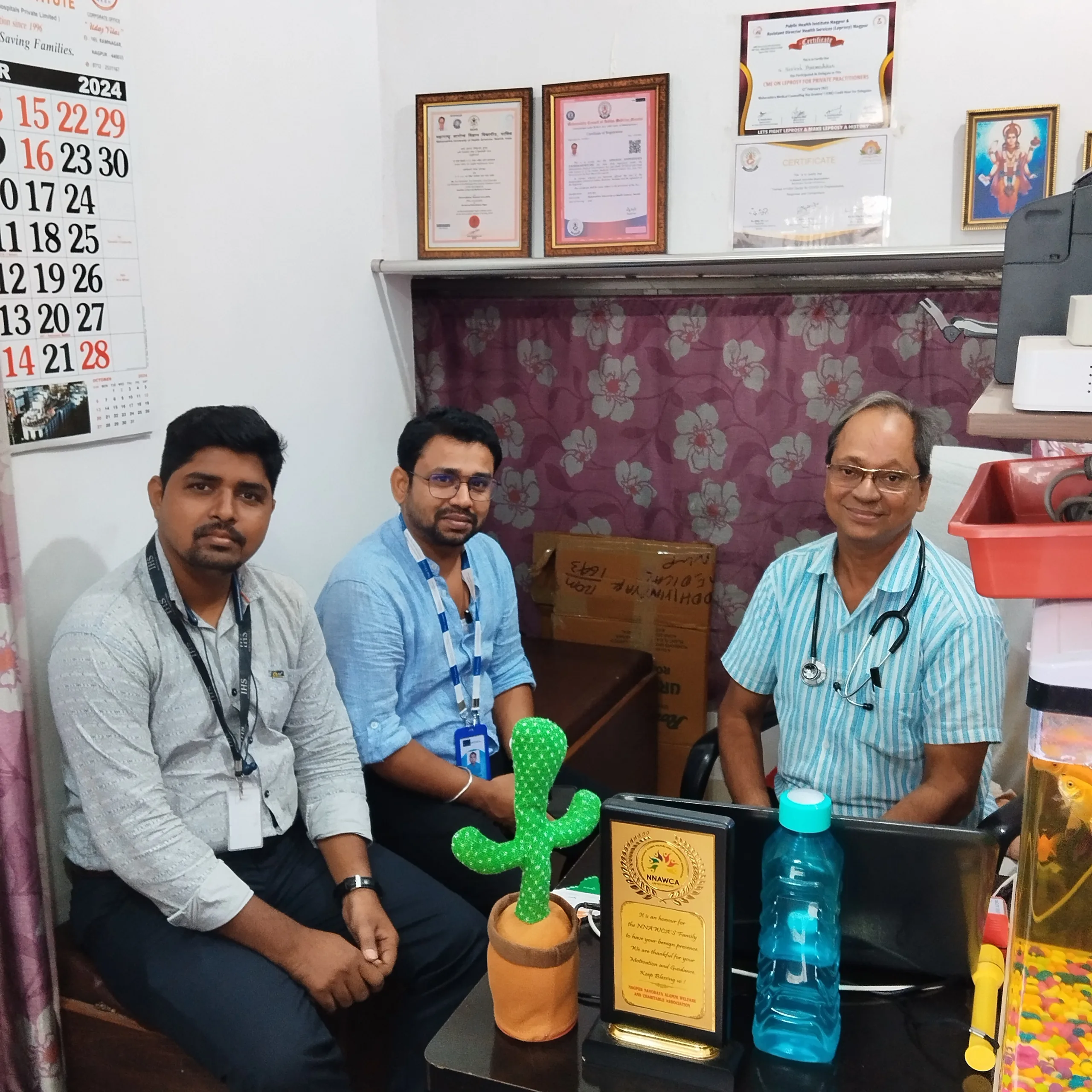 Professional discussion on tuberculosis care at Dr. N. A. Dharmadhikari Clinic.